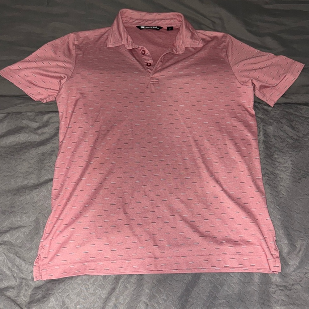I am selling a pink/gray Travis Mathew’s golf shirt. Slightly used(honestly)